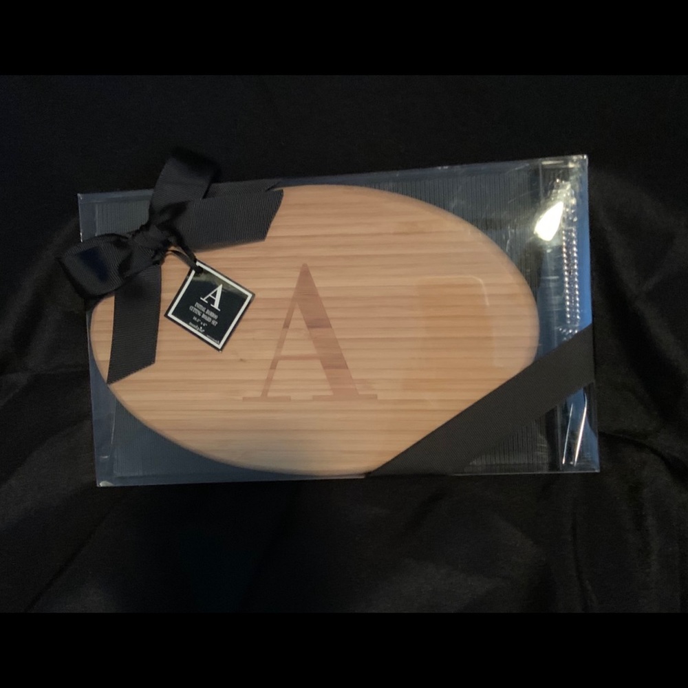 3/$20 NIB Initial “A” Bamboo cutting board set.